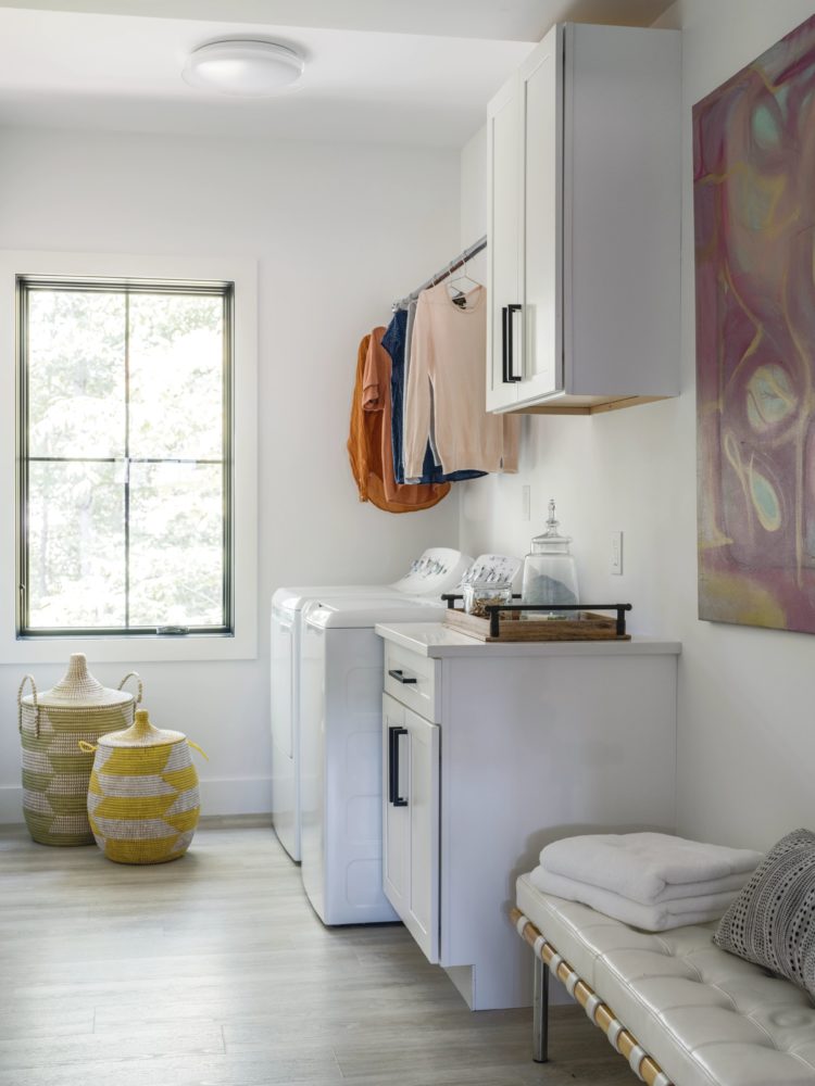 Mantra Omni Snow laundry configuration with mudroom bench