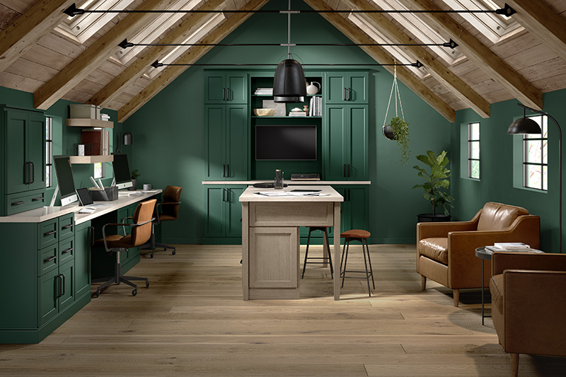 An ideal work from home space by Starmark - Edgemore cabinet style on Maple with Bottle Green cabinet finish and Edgemore cabinet style on Oak with Tarragon cabinet finish