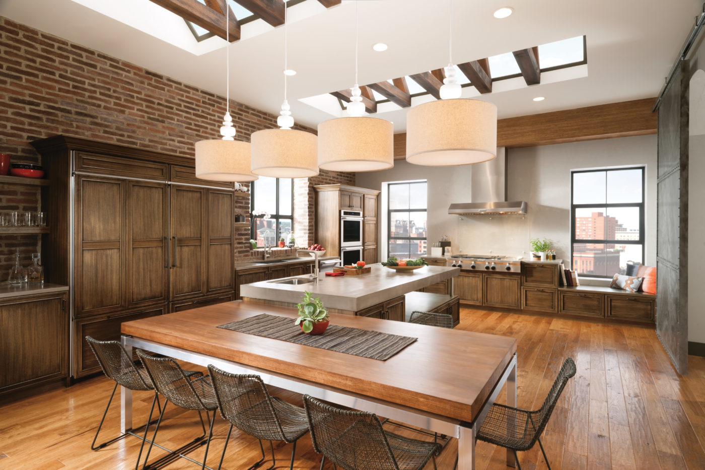 Combine your table with your island to extend seating while saving some space.