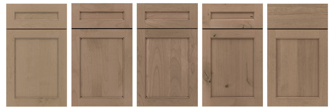 Cabinet door fronts showing the difference when the same stain is applied to different species of wood.