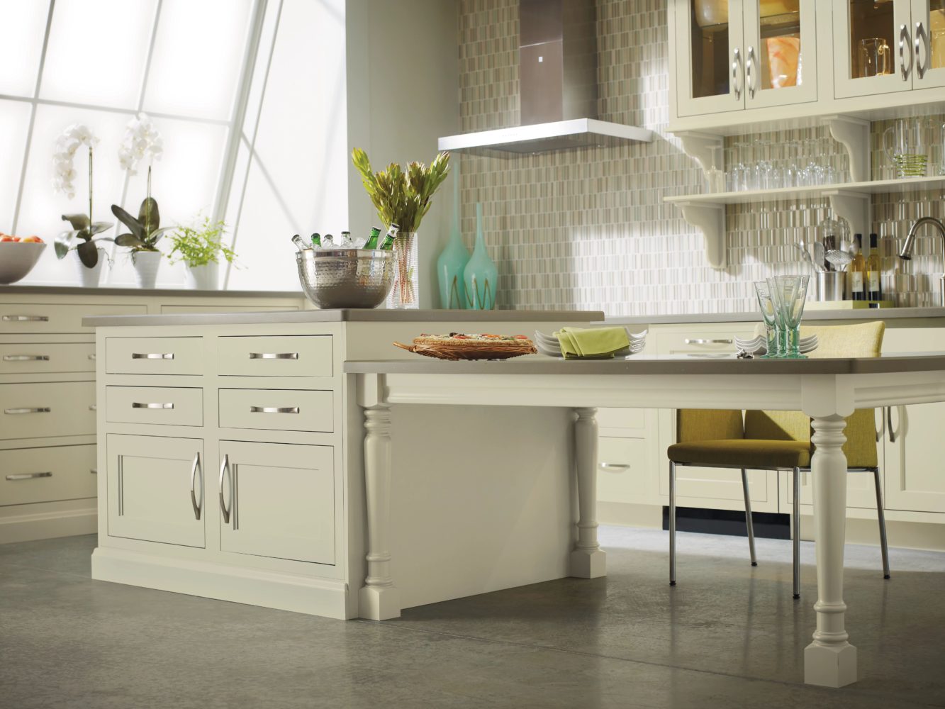 organic, pale green kitchen cabinetry with large picture window